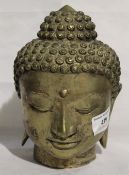 A brass Buddha head