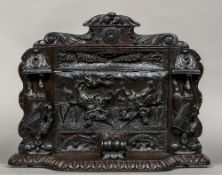 A 19th century carved oak bracket CONDITION REPORTS: Generally in good condition,