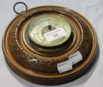 A walnut framed barometer