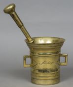 An 18th/19th century Continental bronze pestle and twin handled mortar CONDITION