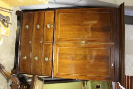 An Edwardian mahogany linen press