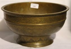A brass engraved bowl