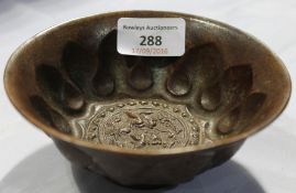 A Chinese bronze bowl