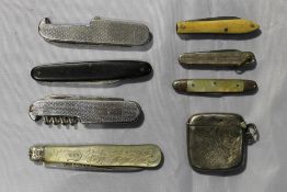 Seven various penknives and a silver vesta case