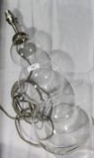 A large retro hand blown clear glass vase, of three tiered bulbous form,