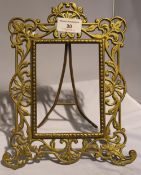 A ornate brass frame