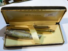 A boxed Sheaffer gold plated fountain pen and a penknife