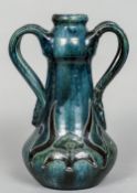 An Art Pottery twin handled vase CONDITION REPORTS: Generally in good condition,