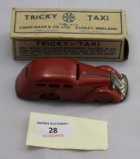 A boxed Louis Marx tricky taxi