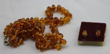 An amber necklace and earrings
