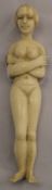 A late 19th/early 20th century ivory figure of a nude lady