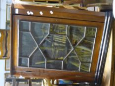 A 19th century mahogany hanging corner cabinet