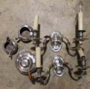 A pair of plated wall lights and a plated tea set