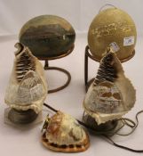 A painted ostrich egg and another and two carved shell formed lamps - EGG WITHDRAWN