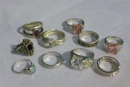 Ten silver rings