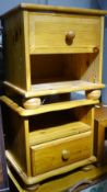 A pair of pine bedside units