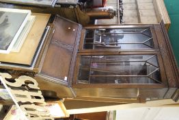 An early 20th century oak bureau bookcase