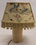 An early 20th century pottery table lamp