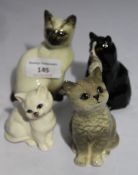 Four Beswick cats