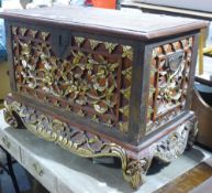 An Eastern carved and painted chest