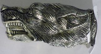 A silver plated dog vesta
