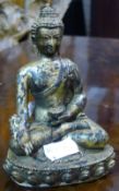 A small bronze Buddha