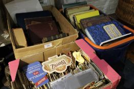 A quantity of various books and a collection of beer mats