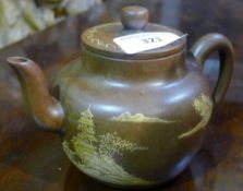 A terracotta teapot