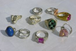 Ten silver rings