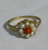 A 9 ct gold pearl and coral ring