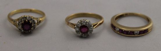 Three diamond and ruby gold rings