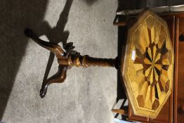 A 19th century specimen wood inlaid octagonal tripod table CONDITION REPORTS: Some