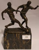 A bronze in the form of footballers