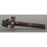 An 18th century Continental bone mounted carved wooden crucifix The reverse with sliding section