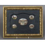 An Italian micro mosaic plaque The shaped panel inset with five scenes of Rome, framed.