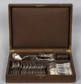An oak cased canteen of Victorian silver cutlery, predominantly hallmarked for 1852,