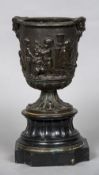 A 19th century patinated bronze vase Decorated in the round with playful putto,