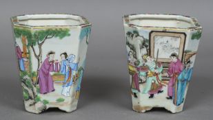 A pair of Chinese porcelain jardinieres Each of tapering canted square section and well painted