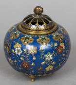 A small late 19th century Oriental cloisonne censor The pierced removable cover decorated in the