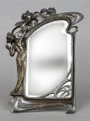 An Art Nouveau WMF style strut mirror Decorated with an elegant young lady and flowers. 47.