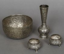 A pair of Indian silver salts With embossed floral decoration;