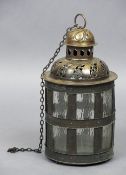 A 19th century brass framed hanging lantern Of domed pierced form with lattice work main body with