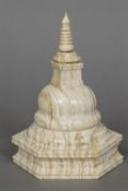 A 19th century Indian carved mammoth's tooth box and cover Worked as a Buddhist Stupa. 18 cm high.