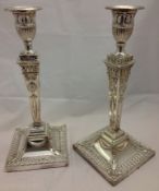 A pair of 19th century style silver candlesticks, hallmarked Sheffield 1989,