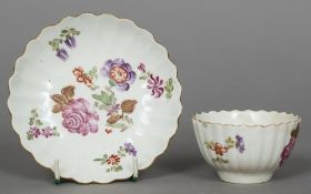 An 18th century porcelain tea bowl and saucer,