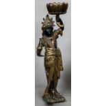 A late 19th/early 20th century Venetian figural Blackamoor figural uplighter Modelled in colourful