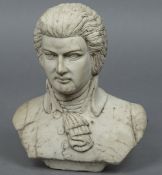 A carved white marble bust, possibly that of Mozart 50 cm high.