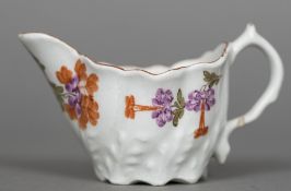 An 18th century Lowestoft porcelain Chelsea cream boat The moulded body polychrome decorated with