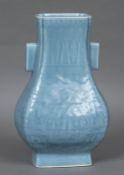 A Chinese porcelain twin handled vase Of baluster square section,
