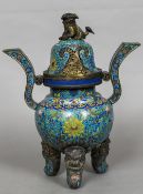 A 19th century Chinese cloisonne twin handled tripod censor and cover The pierced cover with temple